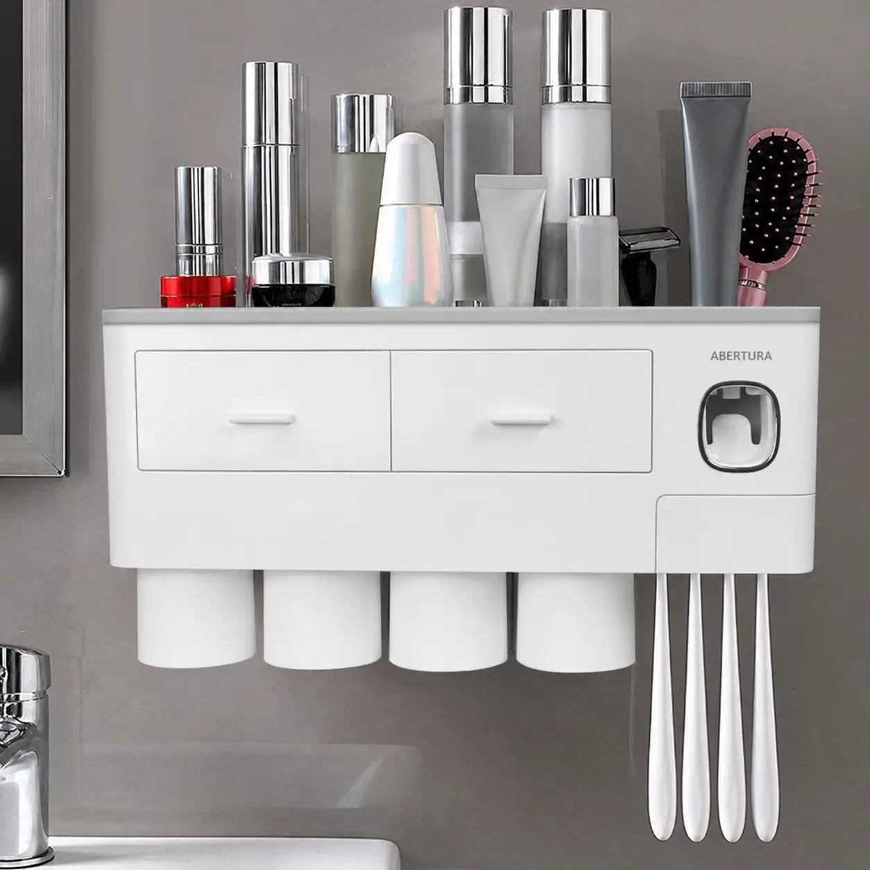 Soporte organizador para baño con dispensador automático doble, vasos invertidos y bandeja amplia para ahorrar espacio junto al lavabo cada mañana