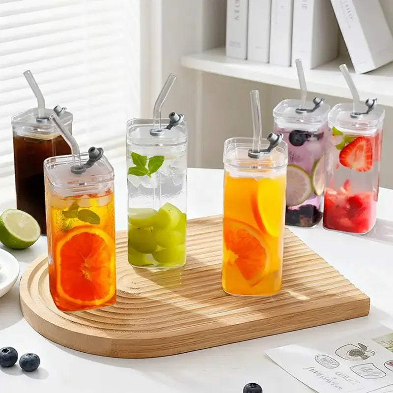 Juego de 4 vasos cuadrados de vidrio de 385 ml, con tapa de plástico y popote de vidrio reutilizable, elegancia moderna y práctico para bebidas